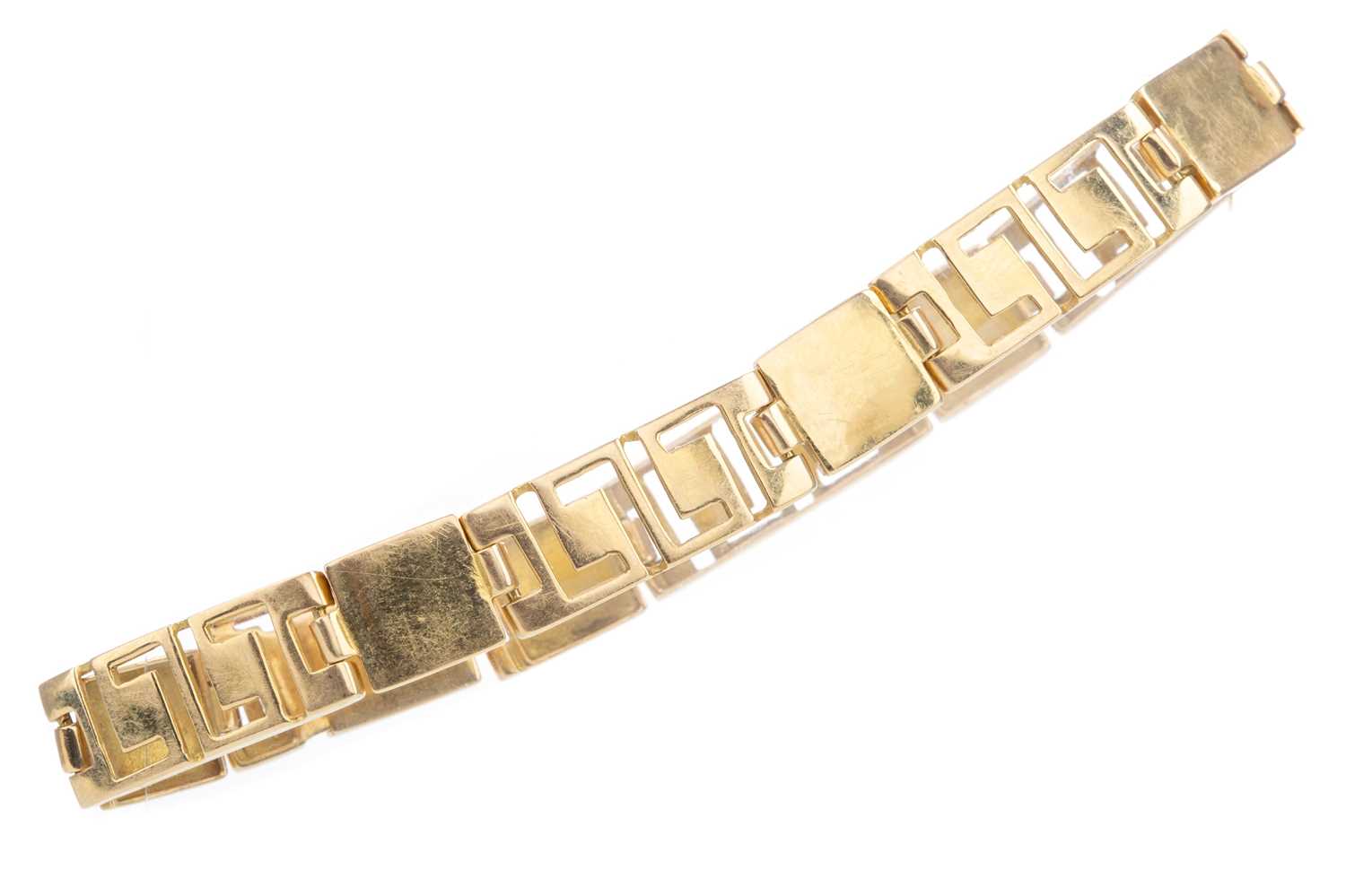 Lot 403 AN EIGHTEEN CARAT GOLD GREEK KEY PATTERN lot-403-an-eighteen-carat-gold-greek-key-pattern