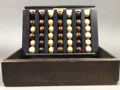 Lot 527 - A REMY MARTIN COGNAC LE PASSE TEMPS WOODEN GAME