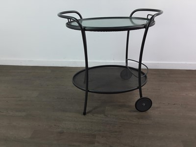 Lot 504 - A METAL OVAL DRINKS TROLLEY