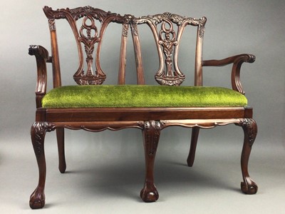 Lot 514 - A MINIATURE MAHOGANY CHIPPENDALE STYLE SETTEE