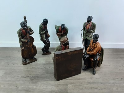 Lot 595 - A SET OF SIX RESIN JAZZ PLAYERS