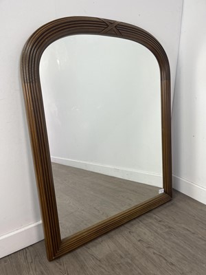 Lot 597 - A STAINED WOOD ARCHED WALL MIRROR