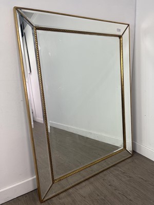 Lot 603 - A GILT FRAMED WALL MIRROR