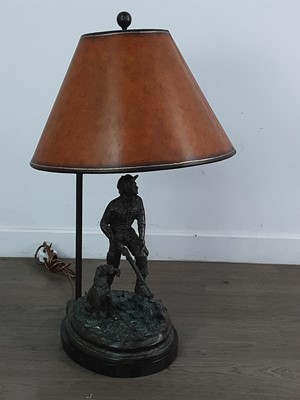 Lot 608 - A METAL FIGURAL TABLE LAMP