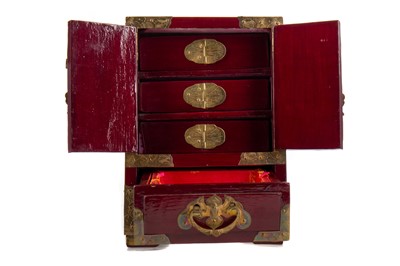 Lot 1160 - A CHINESE BRASS MOUNTED LACQUERED TABLE CABINET