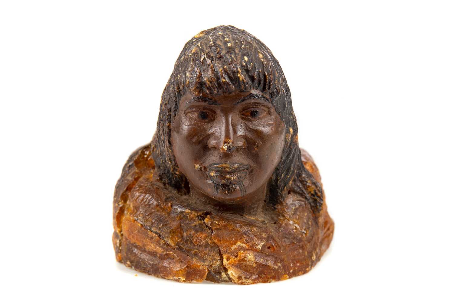 Lot 139 - A MAORI KAURI GUM CARVING OF AN ELDER