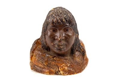 Lot 139 - A MAORI KAURI GUM CARVING OF AN ELDER