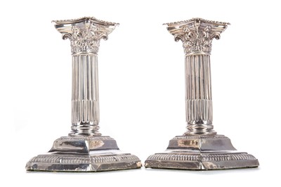 Lot 226 - A PAIR OF EDWARDIAN SILVER CORINTHIAN COLUMN CANDLESTICKS