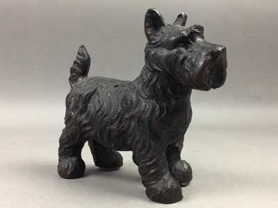 Lot 644 - A BRONZED CAST METAL MODEL OF A TERRIER DOG