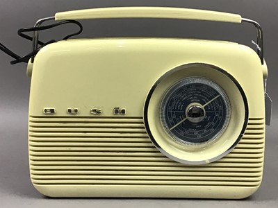 Lot 645 - A VINTAGE BUSH CREAM AND BLUE BAKELITE RADIO AND A TELEPHONE