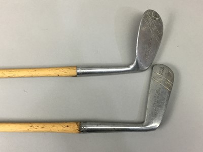 Lot 77 - A LOT OF TWO HILLERICH & BRADSBY HICKORY SHAFTED GOLF CLUBS AND A CANE