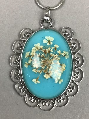 Lot 171 - A TURQUOISE  SILVER PENDANT AND CHAIN AND OTHERS