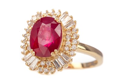 Lot 474 - A GLASS FILLED RUBY AND DIAMOND RING