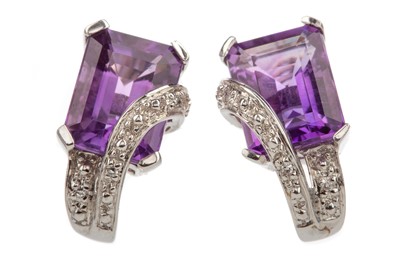Lot 1121 - A PAIR OF WHITE GOLD AMETHYST AND DIAMOND EARRINGS