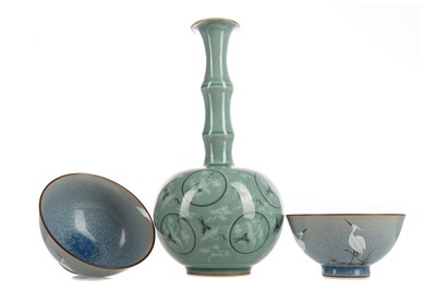 Lot 1370 - A KOREAN CELADON BOTTLE VASE, AND TWO RICE BOWLS