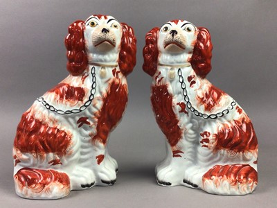 Lot 261 - A PAIR OF VICTORIAN STONEWARE WALLY DOGS