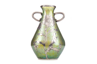 Lot 555 - ATTRIBUTED TO LOETZ, AN ART NOUVEAU SILVER OVERLAID IRIDESCENT GLASS VASE