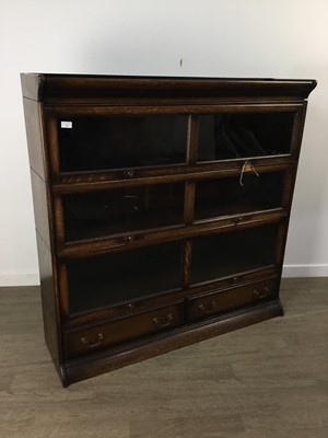 Lot 220 - AN OAK SECTIONAL BOOKCASE