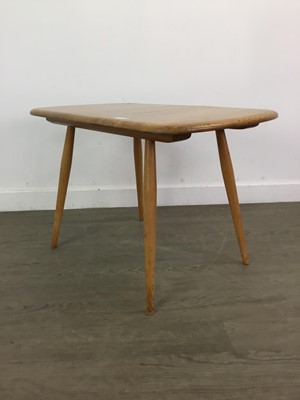 Lot 569 - AN ERCOL ELM COFFEE TABLE