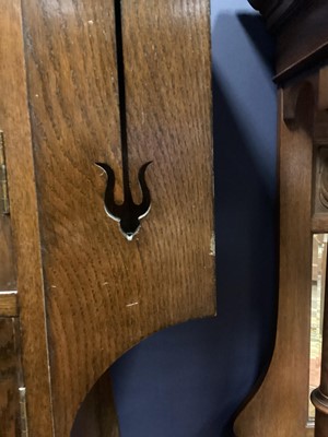 Lot 570 - AN ARTS & CRAFTS OAK HALL ROBE IN THE MANNER OF SHAPLAND & PETTER