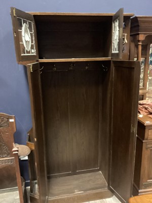 Lot 570 - AN ARTS & CRAFTS OAK HALL ROBE IN THE MANNER OF SHAPLAND & PETTER