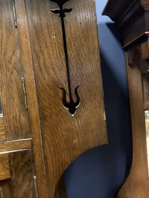 Lot 570 - AN ARTS & CRAFTS OAK HALL ROBE IN THE MANNER OF SHAPLAND & PETTER