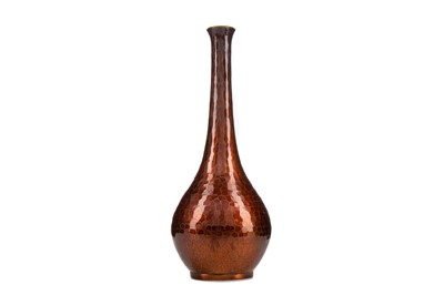 Lot 1389 - A JAPANESE HAMMERED COPPER BOTTLE VASE