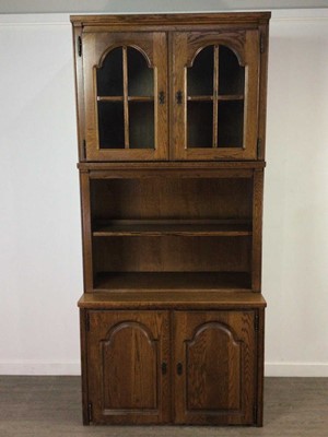 Lot 363 - AN OAK DISPLAY CABINET