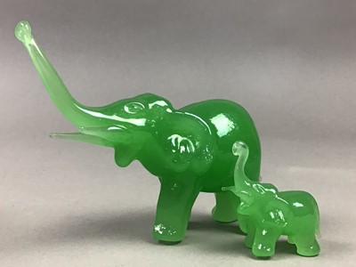 Lot 403 - A GROUP OF EIGHT GREEN MODELS OF GLASS ELEPHANTS