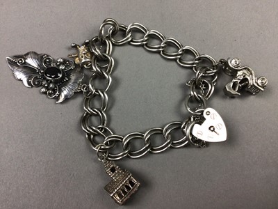 Lot 408 - TWO SILVER CHARM BRACELETS