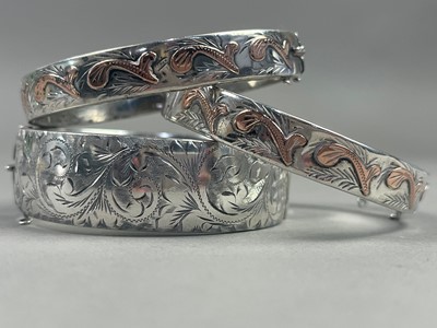 Lot 414 - A GROUP OF SILVER BANGLES