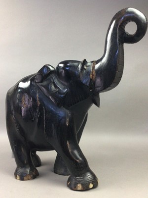 Lot 449 - A CARVED WOOD MODEL OF AN ELEPHANT