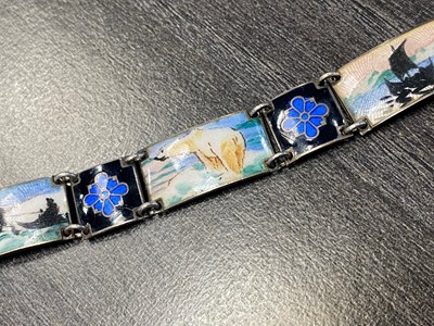 Lot 523 - A SCANDINAVIAN SILVER AND ENAMEL PENDANT AND BRACELET