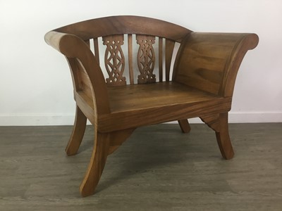 Lot 599 - A HARDWOOD BENCH