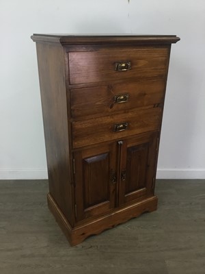 Lot 601 - A STAINED PINE TALLBOY