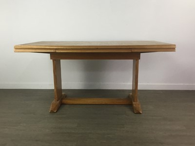 Lot 609 - A WALNUT DINING TABLE WITH SIX CHAIRS