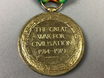 Lot 571 - A LOT OF THREE WWI CAMPAIGN MEDALS AND A WWII MEDAL