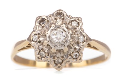 Lot 546 - A DIAMOND DAISY CLUSTER RING