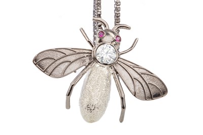 Lot 554 - A MOISSANITE FLY PENDANT