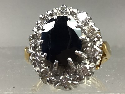 Lot 2 - A SAPPHIRE AND DIAMOND CLUSTER RING