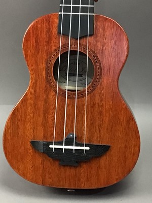 Lot 150A - AN AKLOT UKULELE AND A SMALL CORDOBA GUITAR