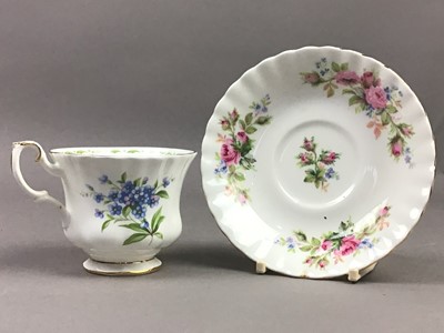 Lot 92 - A ROYAL ALBERT MOSS ROSE TEA SERVICE AND FORGET-ME-NOT CUPS AND SAUCERS