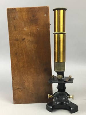 Lot 117 - A VINTAGE BRASS MICROSCOPE