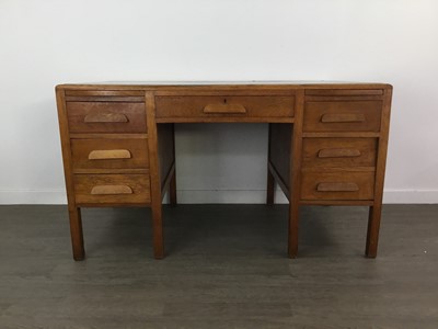 Lot 263 - A LEATHER TOPPED DESK AND A CHAIR