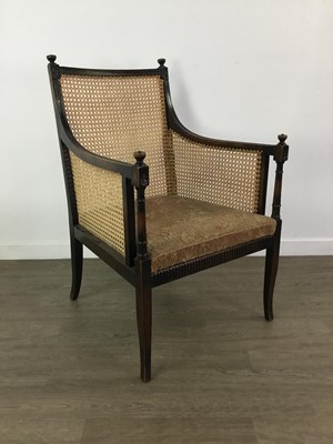 Lot 205 - A CANE BACK ARMCHAIR