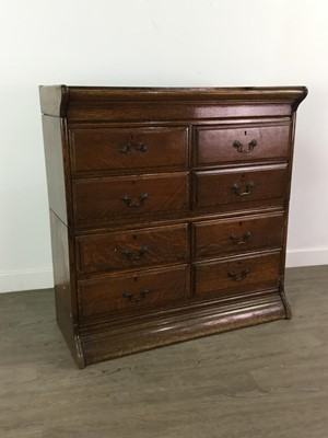 Lot 207 - AN OAK CHEST OF DRAWERS