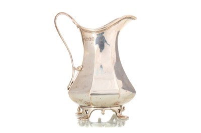 Lot 24 - EDWARDIAN ARTS & CRAFTS SILVER CREAM JUG