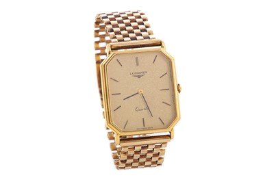 Lot 826 - A GENTLEMAN'S LONGINES NINE CARAT GOLD QUARTZ WRIST WATCH