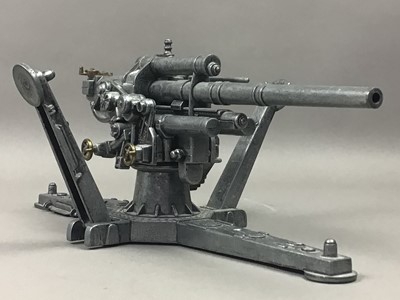 Lot 395 - A MODEL OF AN ARTILLERY GUN, ALONG WITH TWO FIGURES