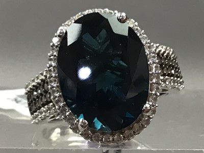 Lot 370 - A LONDON BLUE TOPAZ AND DIAMOND RING